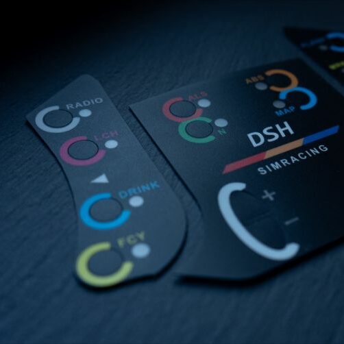 Racing Time - Lenkradpaneele aus Kunststoff und 4-farbig plus Deckweiss bedruckt und im Anschluss laminiert und am Ende mittels Zündplotter geschnitten.